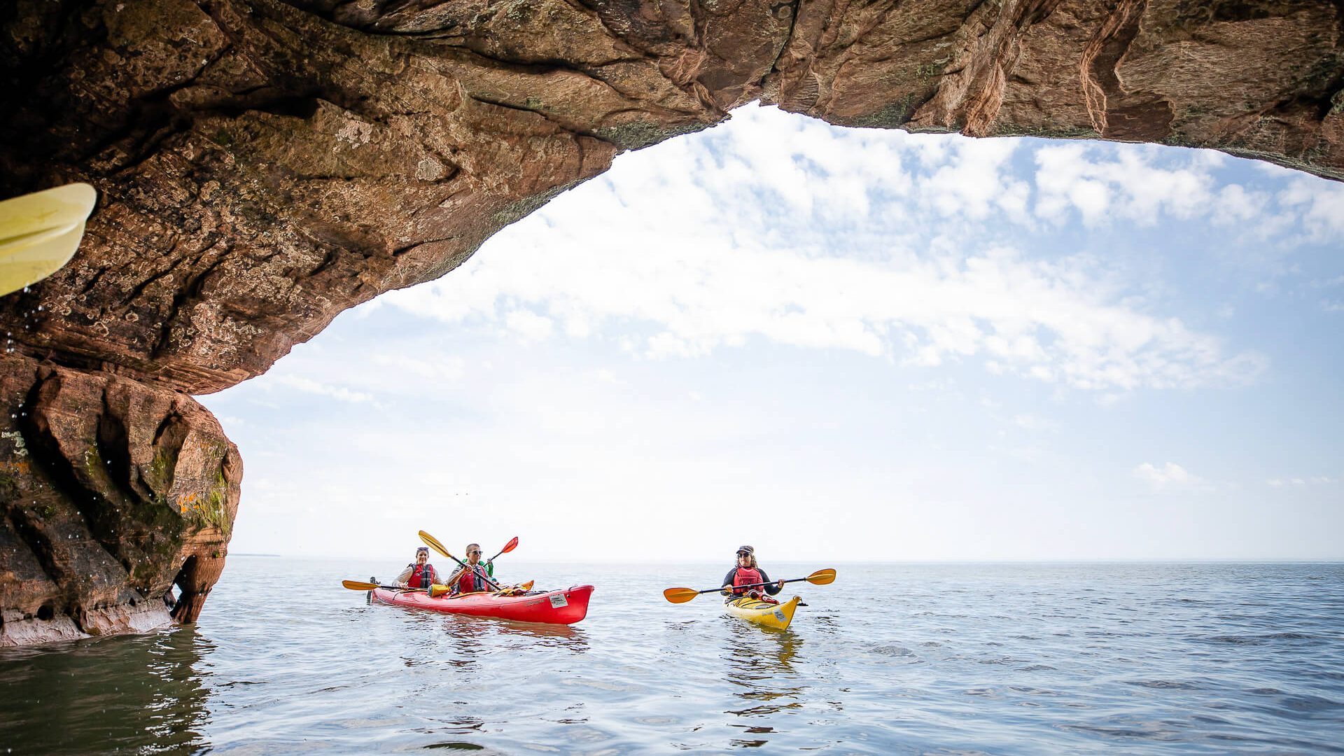 Kayakers in Sea Caves at Apostle Islands in Bayfield
