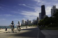 couple bicycling on lakefront in chicago