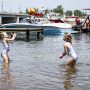 girls playing in lake in Minocqua Wisconsin