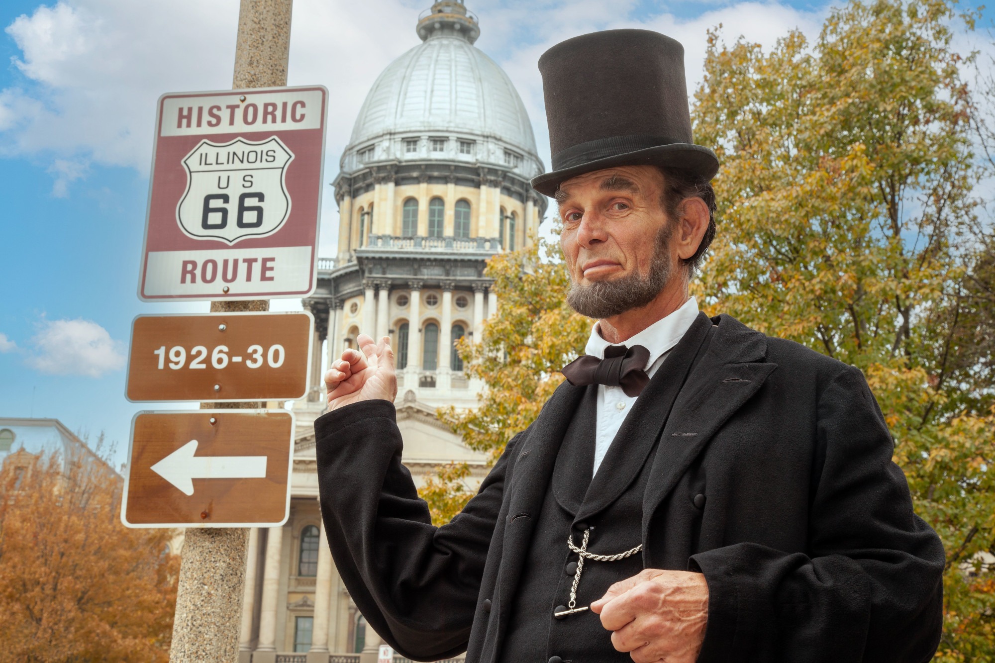 Abe Lincoln actor in front of Route 66 sign in Springfield Illinois