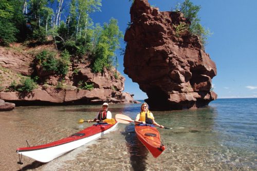 Kayaking at the Apostle Islands National Lakeshore on Lake Superior in northern Wisconsin Kayaking at the Apostle Islands National Lakeshore on Lake Superior in northern Wisconsin
