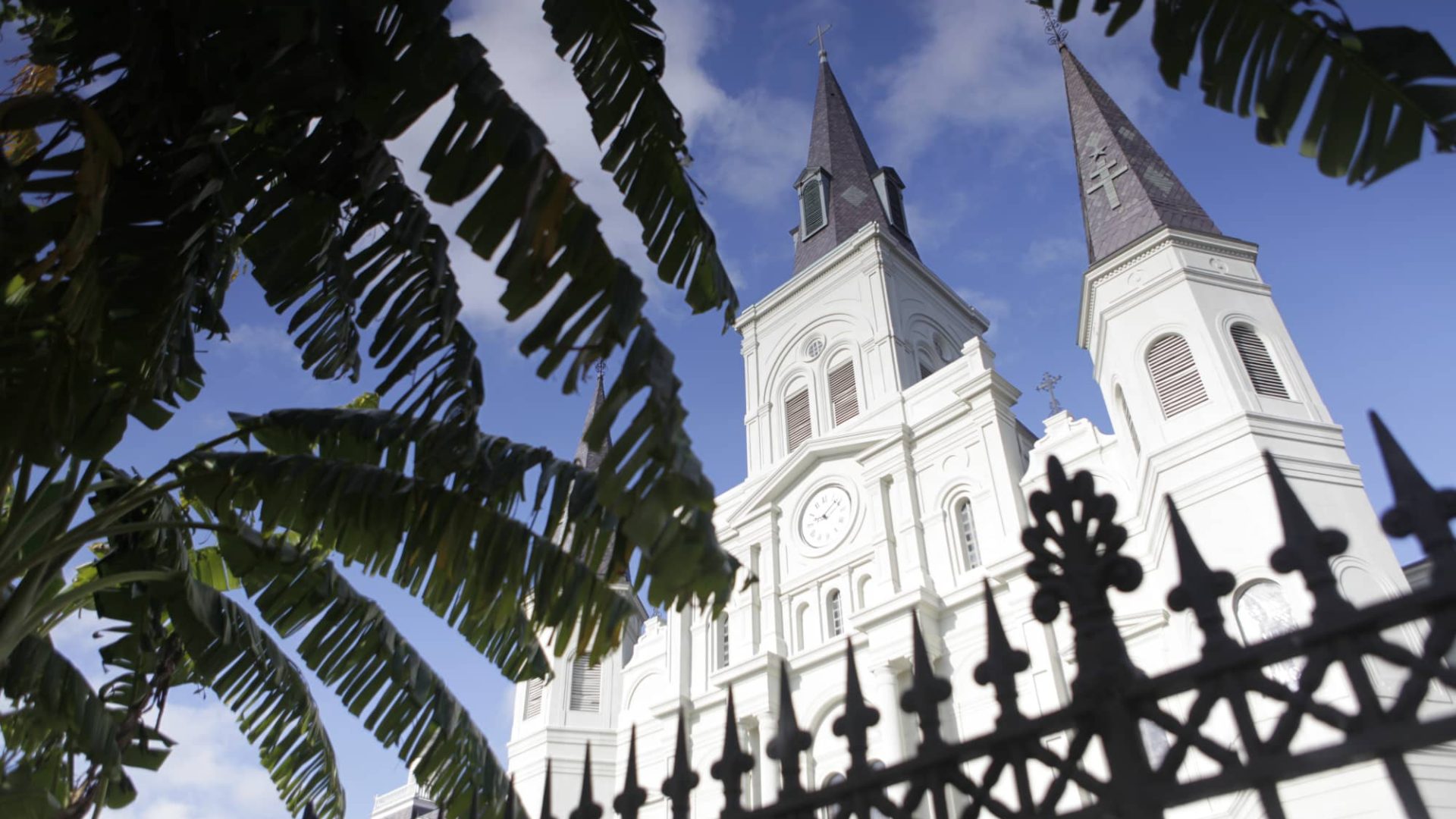 upward facing shot of st louis cathedral in jackson square in the french quarter of new orleans